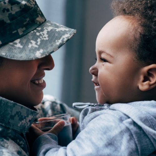 Military mom and baby with Tricare Overseas breast pump coverage